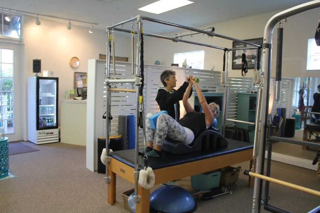 Clients working on the reformers in the apparatus room